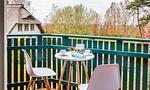 Balkon mit Tisch und Stühlen - Strandidyll - Top-Hundeurlaub