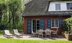 Terrasse mit Tisch und Stühlen - Worpswede - Top-Hundeurlaub