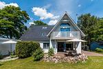 Außenansicht eines Hauses mit Garten und Balkon - Drei Akazien Wohnung 1 - Top-Hundeurlaub