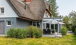 Terrasse mit Möbeln und Sonnenschirm - Strandrausch - Top-Hundeurlaub