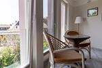 Balkon mit gemütlichen Stühlen und Tisch - Muschel 4 - Top-Hundeurlaub