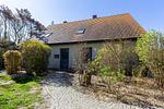 Außenansicht eines Ferienhauses mit Garten - Strandhaus Wustrow - Wohnung 2 - Top-Hundeurlaub