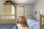 Schlafzimmer mit zwei Einzelbetten - Strandhaus Wustrow - Wohnung 1 - Top-Hundeurlaub