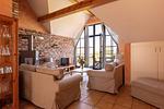 Gemütliches Wohnzimmer mit Blick auf die Terrasse - Strandhaus Wustrow - Wohnung 5 - Top-Hundeurlaub
