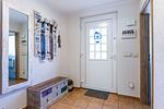 Eingangsbereich mit Garderobe und Schuhkommode - Ostseeromantik - Top-Hundeurlaub