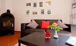 Gemütliches Wohnzimmer mit Sofa und Kamin - Windflüchter, Landhaus Haven Höövt - Top-Hundeurlaub