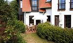 Terrasse mit Tisch und Stühlen - Windflüchter, Landhaus Haven Höövt - Top-Hundeurlaub