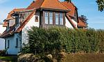 Außenansicht eines charmanten Hauses mit Ziegeldach - Windflüchter, Landhaus Haven Höövt - Top-Hundeurlaub