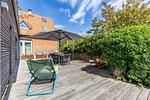Terrasse mit Tisch und Sonnenschirm - Haus Seefeuer 03 - Top-Hundeurlaub