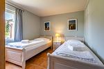 Schlafzimmer mit zwei Einzelbetten - Boddenzauber 01 - Top-Hundeurlaub
