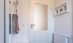 Eingangsbereich mit Spiegel und Garderobe - Wind & Segel - Top-Hundeurlaub
