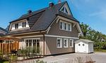 Außenansicht eines Hauses mit Garten - Wind & Segel - Top-Hundeurlaub