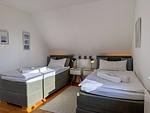Schlafzimmer mit zwei Einzelbetten - Wieckend - Top-Hundeurlaub