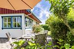 Terrasse mit Tisch und Stühlen - Bootshus - Top-Hundeurlaub