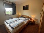 Schlafzimmer - Ferienhaushälfte Fenja - Top-Hundeurlaub