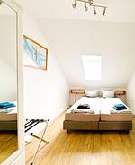 Schlafzimmer - Ferienwohnung Pamirhuus - Top-Hundeurlaub