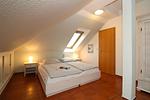 Schlafzimmer - Appartementhaus Villa Sanssouci Fewo 1 "Möwennest" - Top-Hundeurlaub