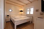 Schlafzimmer - Haus Heckenrose Whg. 4 Gartenhaus - Top-Hundeurlaub