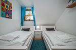 Schlafzimmer mit zwei Einzelbetten - Reihenhaus 5b - Seehund - Top-Hundeurlaub