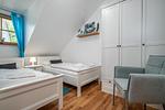 Schlafzimmer mit zwei Einzelbetten - Reihenhaus 5b - Seehund - Top-Hundeurlaub