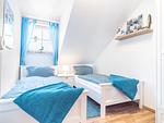 Schlafzimmer mit zwei Einzelbetten - Reihenhaus 5b - Seehund - Top-Hundeurlaub