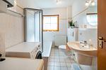 Schlafzimmer mit Badewanne - Wohnung 1.1 - Seestern - Top-Hundeurlaub