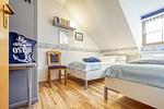 Schlafzimmer mit zwei Einzelbetten - Reihenhaus 7a - Otter - Top-Hundeurlaub