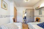 Schlafzimmer mit zwei Einzelbetten - Reihenhaus 7a - Otter - Top-Hundeurlaub