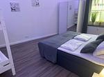 Schlafzimmer - KRABBENNEST Ferienwohnung mit Whirlpool und Infrarotsauna - Top-Hundeurlaub