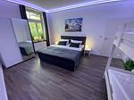 Schlafzimmer - KRABBENNEST Ferienwohnung mit Whirlpool und Infrarotsauna - Top-Hundeurlaub
