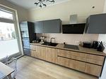 Küche / Küchenzeile - OSTSEEKRABBE Premium Ferienwohnung familienfreundlich, zentral - Top-Hundeurlaub