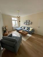 Wohnzimmer - OSTSEEKRABBE Premium Ferienwohnung familienfreundlich, zentral - Top-Hundeurlaub