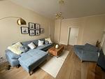 Wohnzimmer - OSTSEEKRABBE Premium Ferienwohnung familienfreundlich, zentral - Top-Hundeurlaub