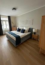 Schlafzimmer - OSTSEEKRABBE Premium Ferienwohnung familienfreundlich, zentral - Top-Hundeurlaub