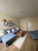 Wohnzimmer - OSTSEEKRABBE Premium Ferienwohnung familienfreundlich, zentral - Top-Hundeurlaub