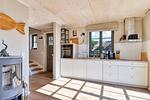 Küche / Küchenzeile - Ferienhaus Haus Kormoran 21 Feriendorf Klein Stresow Rügen - Top-Hundeurlaub
