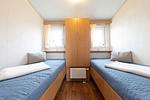 Schlafzimmer - Ferienhaus "Zum Seepferdchen" Mellumplate 06 - Top-Hundeurlaub