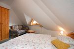 Schlafzimmer mit Doppelbett - Wohnung 13b - Haubentaucher - Top-Hundeurlaub