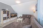 Wohnzimmer - Ferienhaus Strandmöwe OG mit Balkon sowie Garten mit Spielanlage - Top-Hundeurlaub