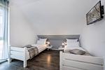 Schlafzimmer - Ferienhaus Strandmöwe OG mit Balkon sowie Garten mit Spielanlage - Top-Hundeurlaub
