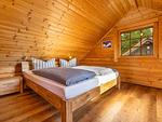 Schlafzimmer - Blockhaus James Cook - Meerblick - Top-Hundeurlaub