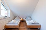 Schlafzimmer 2 - Ferienhaus Küstenwusel - Top-Hundeurlaub