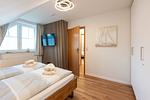 Schlafzimmer 1 - Ferienhaus Küstenwusel - Top-Hundeurlaub