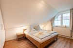 Schlafzimmer 1 - Ferienhaus Küstenwusel - Top-Hundeurlaub