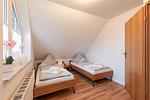 Schlafzimmer 2 - Ferienhaus Küstenwusel - Top-Hundeurlaub