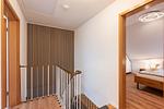 Flur im Obergeschoss mit Blick auf Schlafzimmer 1 - Ferienhaus Küstenwusel - Top-Hundeurlaub