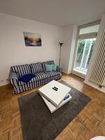 Wohnzimmer - Apartment BERNSTEIN im EG mit Garten, Infrarot-Sauna - Top-Hundeurlaub