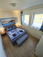 Schlafzimmer - Fewo Möwe Lütow Usedom Achterwasser blaues Haus - Top-Hundeurlaub
