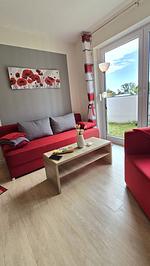 Gartenblick - Ferienwohnung in Lütow auf Usedom – Mohnblume am Achterwasser - Top-Hundeurlaub