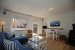 Essbereich mit TV im Wohnzimmer - Haus 54b - Top-Hundeurlaub